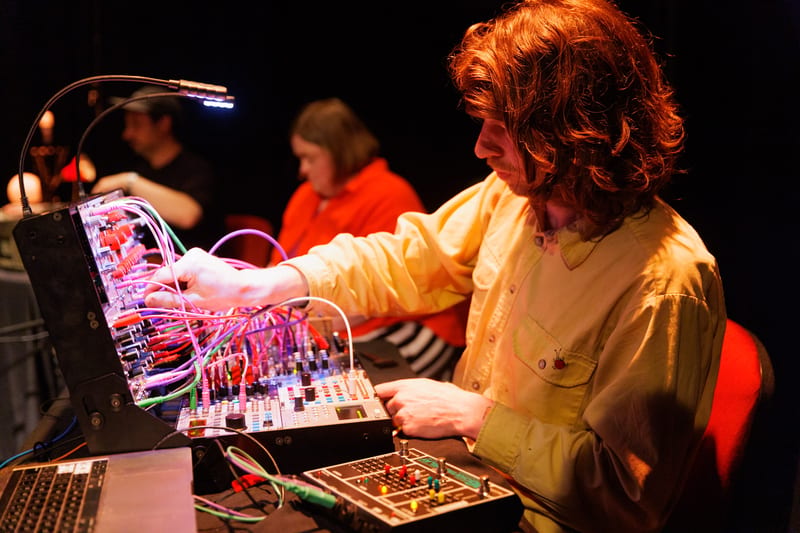 A mixed-ability ensemble performing on stage at the Safe in Sound Festival